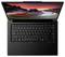 Laptop mit schwarzer Tastatur und TrackPoint, geöffnet vor einem Sonnenuntergangshintergrund auf dem Bildschirm, leuchtende Farben.