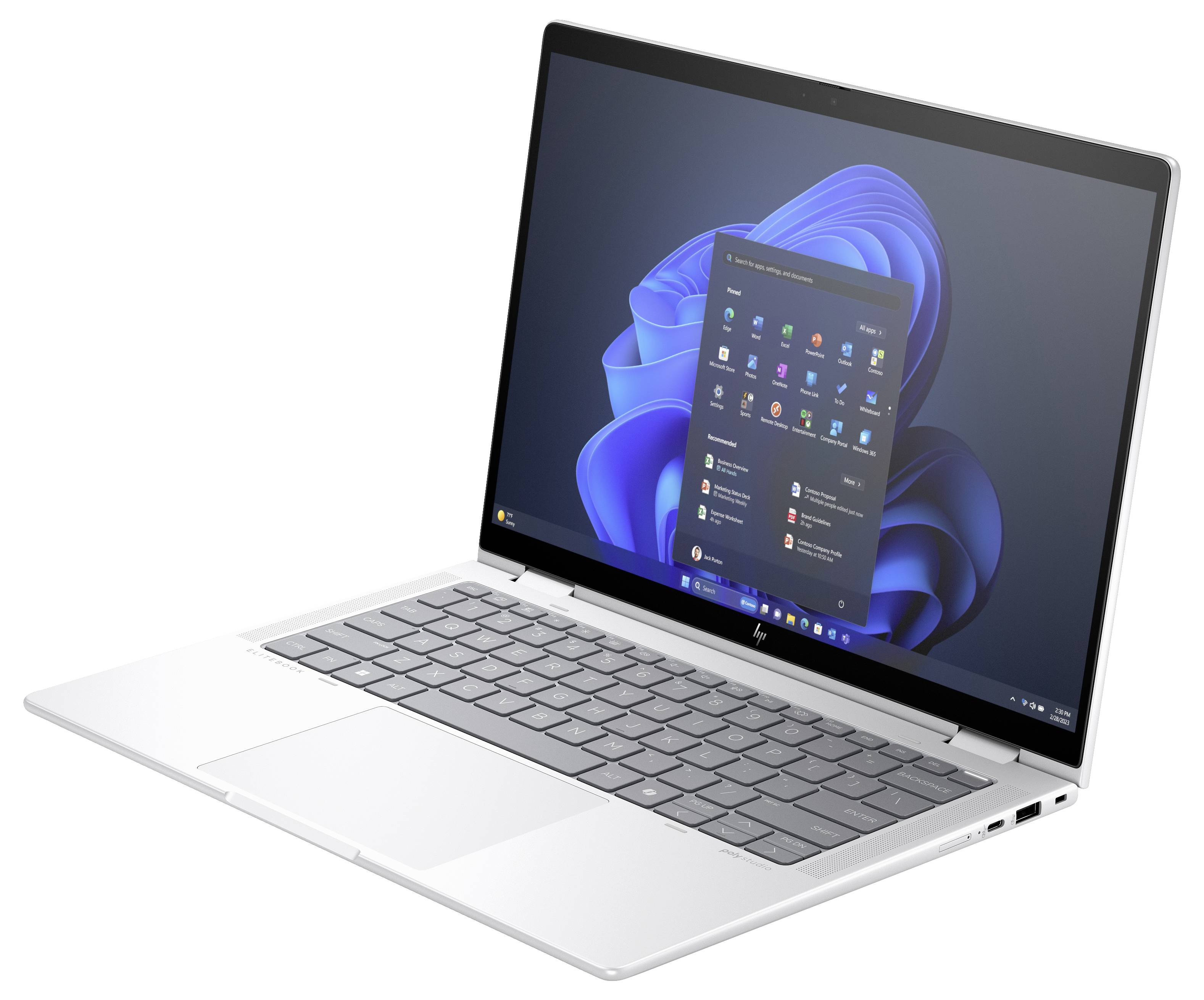 Ein Laptop mit geöffnetem Bildschirm zeigt den Windows 11 Startbildschirm mit verschiedenen Anwendungs-Icons.
