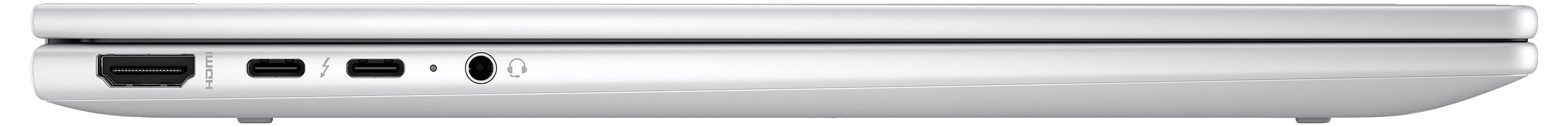 Silberner Laptop von der Seite, zeigt Anschlüsse: HDMI, zwei USB-C und Kopfhöreranschluss. Gerät ist geschlossen.