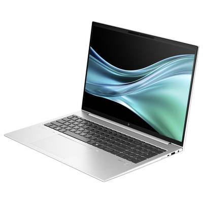 Ein silberner Laptop mit einem geöffneten Bildschirm zeigt abstrakte grün-blaue Wellen auf schwarzem Hintergrund. Tastatur und Trackpad sichtbar.