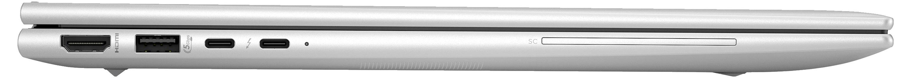 Ein geschlossenes silbernes Laptop von der Seite zeigt Anschlüsse und ein DVD-Laufwerk.