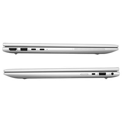 Ein silberner Laptop, Seitenansicht, zeigt verschiedene Anschlüsse einschließlich USB, HDMI und Audio.