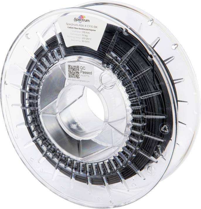 Durchsichtige Filamentspule mit schwarzem 3D-Druckerfilament; Etikett zeigt 'Carbon Fiber Reinforced' Materialdetails.