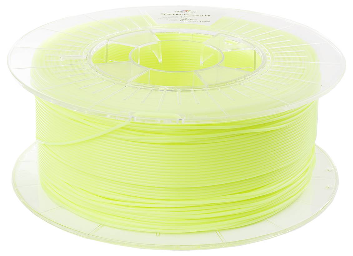 Eine transparente Spule mit neongelbem 3D-Druckerfilament, aufgerollt und bereit für den Einsatz.