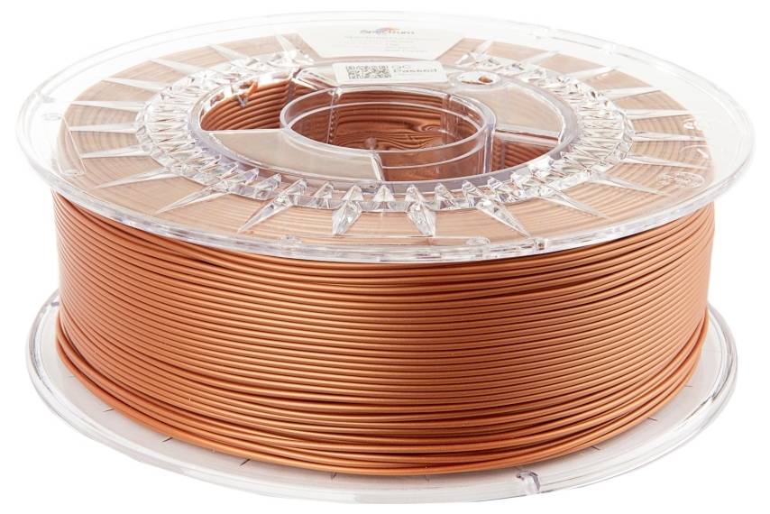 Eine transparente Spule mit kupferfarbenem 3D-Druckerfilament, auf einer glatten, weißen Oberfläche liegend.
