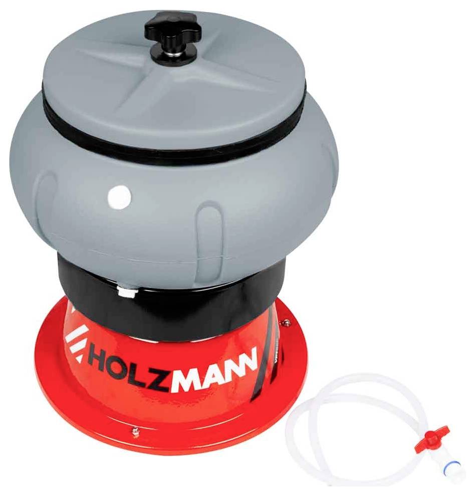 Ein roter und grauer Gerät. Beschriftet mit 'HOLZMANN'. Neben dem Gerät liegt ein transparenter Schlauch mit einem blauen Clip.