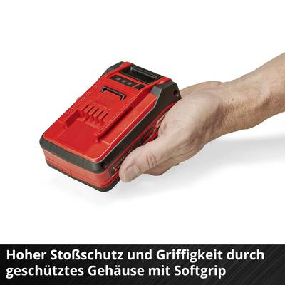 Eine Hand hält einen roten Akku mit Softgrip. Text: 'Hoher Stoßschutz und Griffigkeit durch geschütztes Gehäuse mit Softgrip'.