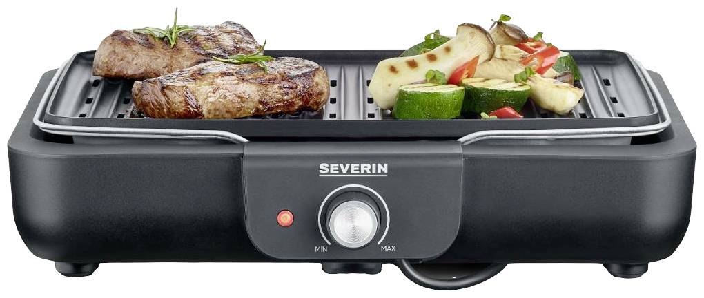 Zwei Steaks und Gemüse auf einem elektrischen Tischgrill; die Steaks wirken saftig, das Gemüse ist gegrillt und bunt.