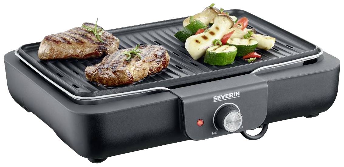 Elektrischer Tischgrill mit zwei gegrillten Fleischstücken und geschnittenem Gemüse, darunter Zucchini und Paprika, auf dem Grillrost.