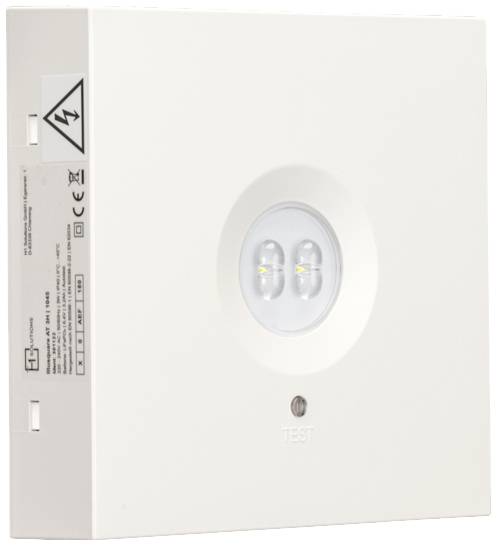 Ein rechteckiges Notlicht mit zwei LEDs und einem Testknopf in der Mitte. An der Seite befinden sich Warn- und Informationssymbole.