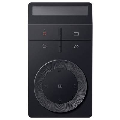 Schwarze Fernbedienung mit D-Pad, Power-Taste, Lautstärkeregelung und weiteren Funktionstasten.