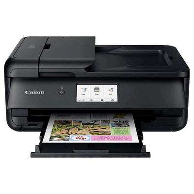 Schwarzer Multifunktionsdrucker druckt farbige Seite mit Bildern und Text. Display zeigt Optionen: Kopieren, Scannen, Drucken.