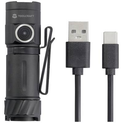 Kompakte schwarze Taschenlampe mit Befestigungsclip, daneben ein USB-C-Ladekabel. Geeignet für wiederaufladbare Nutzung im Outdoor-Bereich.