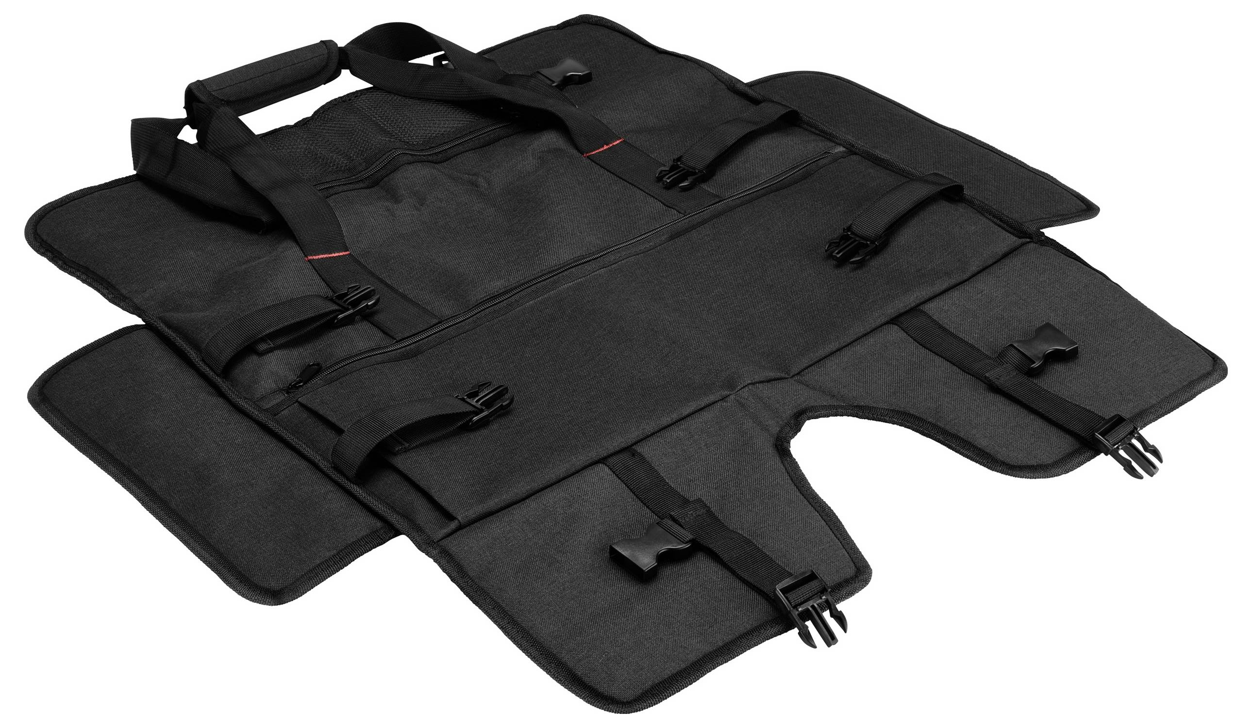 Eine schwarze, faltbare Transporttasche mit mehreren Riemen und Schnallen, ausgelegt auf einer Fläche.