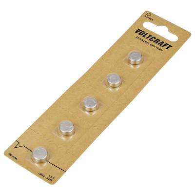 Fünf Knopfzellen-Batterien auf einem braunen Pappstreifen, mit der Aufschrift 'VOLTCRAFT Alkaline Battery'.