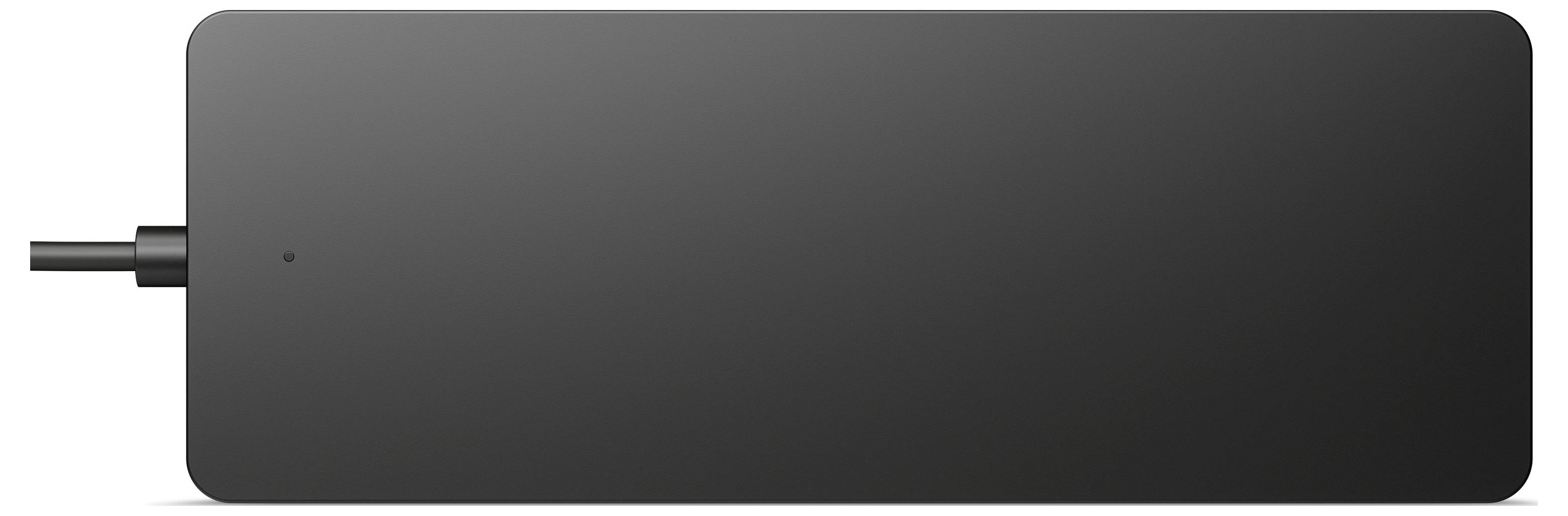 Ein schwarzes Netzteil mit rechteckiger Form und abgerundeten Ecken, ein Kabel ist an der linken Seite angeschlossen.