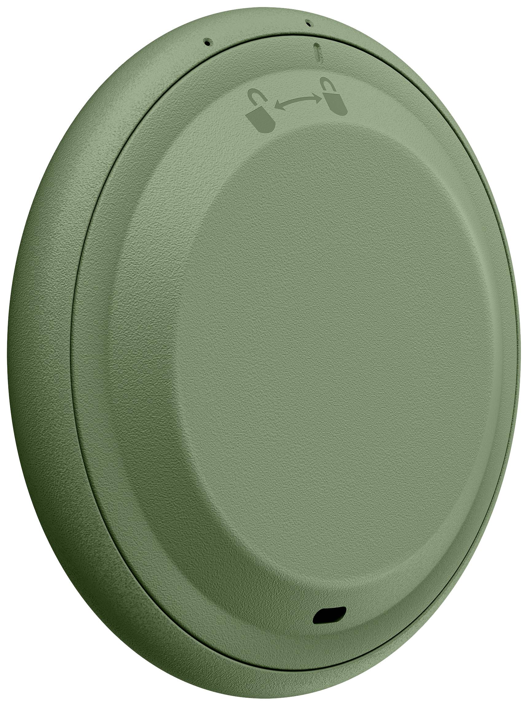 Grüner, runder Lautsprecher mit Hinweis auf drahtlose Kopplung oben.