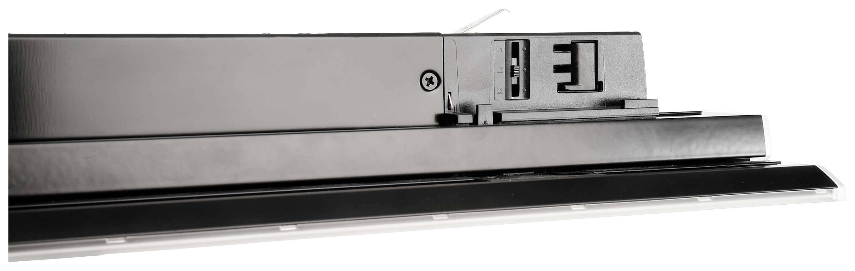 Ein graues elektrisches Gerät mit USB- und HDMI-Anschlüssen, montiert auf einer schwarzen Fläche.