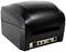 Schwarzer Drucker mit mehreren Anschlüssen auf der Rückseite, darunter USB-, Ethernet- und Netzanschluss. Gerät steht auf einem Tisch.