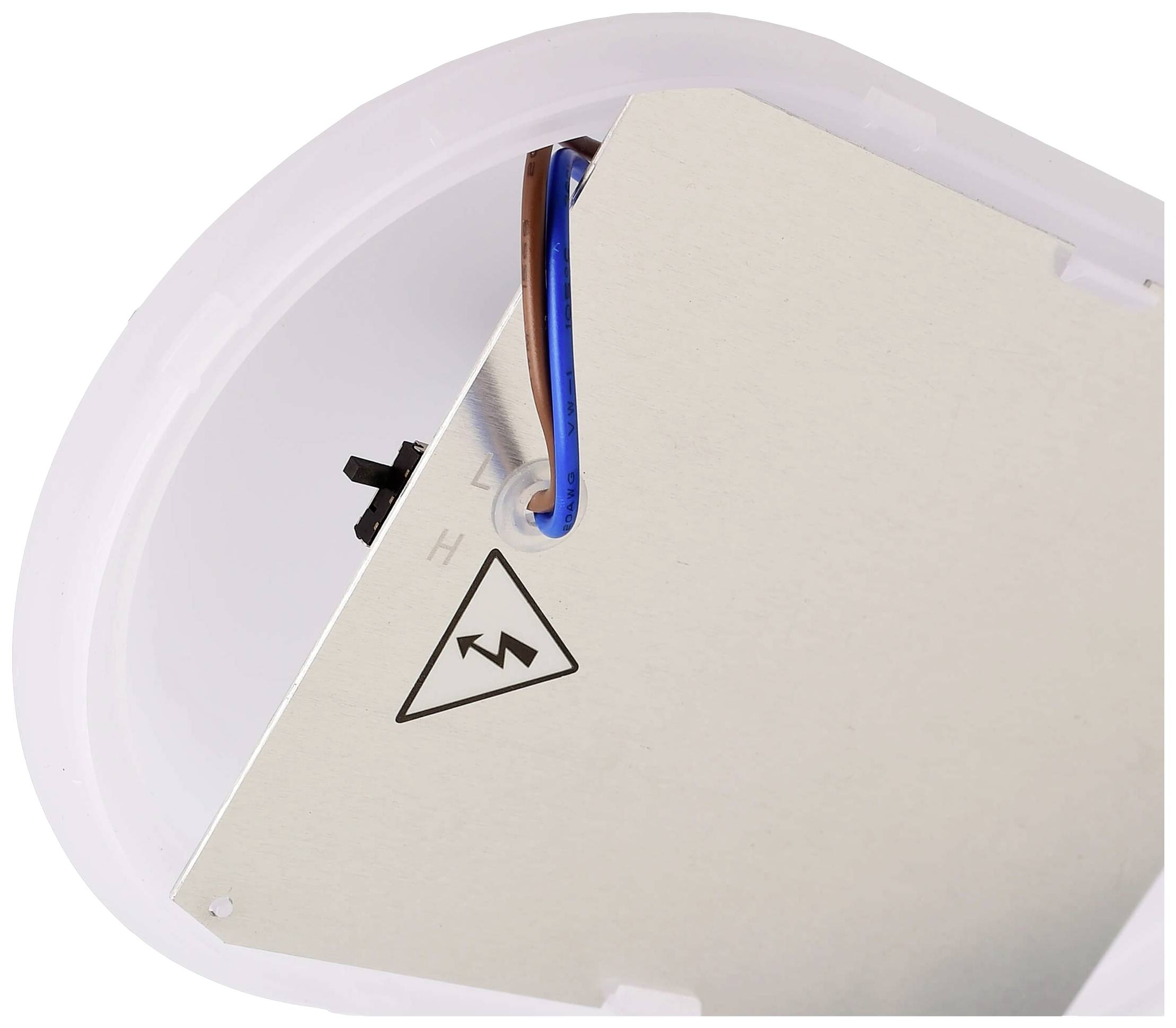 Ein elektrisches Gerät mit einem Warnsymbol für Hochspannung ist abgebildet, teilweise verdeckt von Drähten in Blau und Braun.