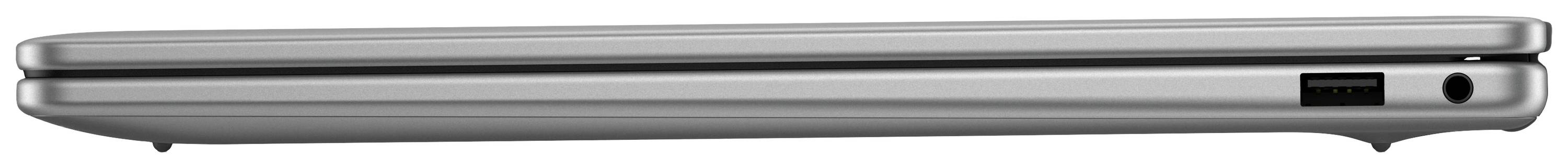 Geschlossener silberner Laptop von der Seite, mit sichtbaren Anschlüssen und schlankem Design.