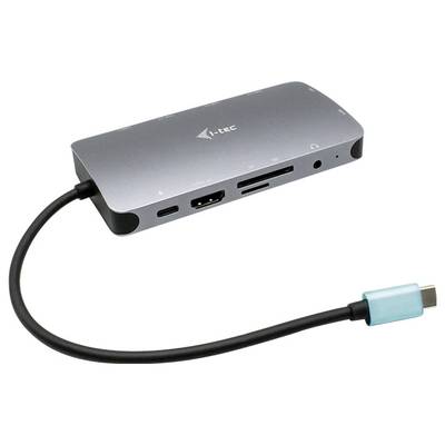 Ein silberner USB-C-Hub mit mehreren Anschlüssen, darunter HDMI, SD-Kartensteckplätze und USB-Ports, verbunden mit einem Kabel.