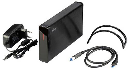 Externe Festplatte mit Netzadapter, USB-Kabel und Halterungen. Geeignet für Datenspeicherung und -übertragung.
