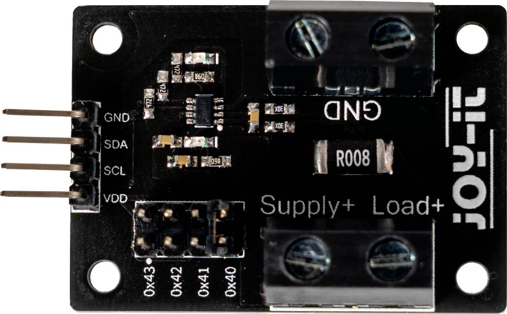 'Elektronisches Modul mit Anschlüssen, Beschriftung: GND, Supply+, Load+, VDD. Platine zeigt kleine elektronische Bauteile.'