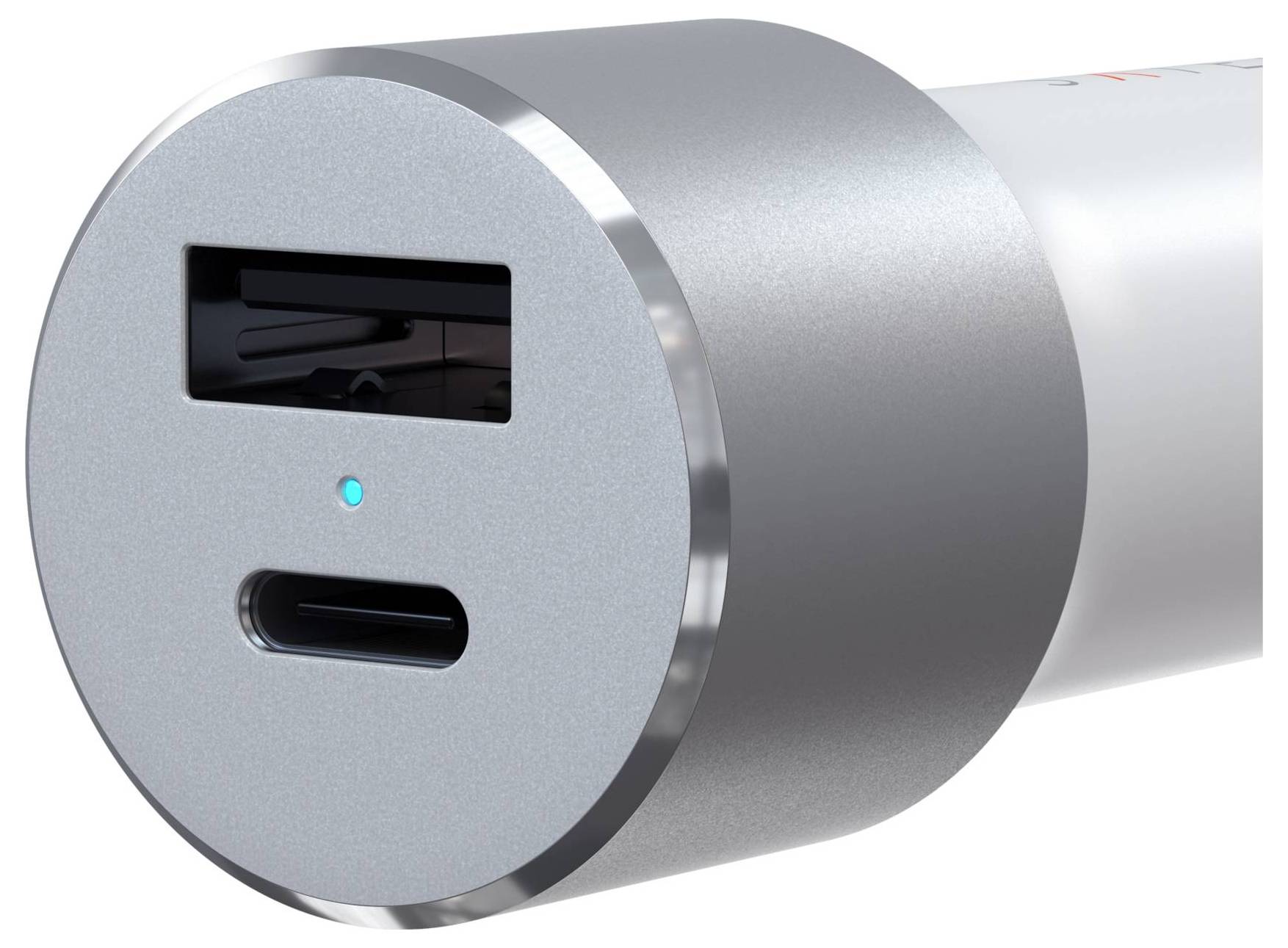Silbernes Ladegerät mit USB-Anschluss und USB-C-Anschluss, zeigt eine blaue LED-Anzeige an der Vorderseite.