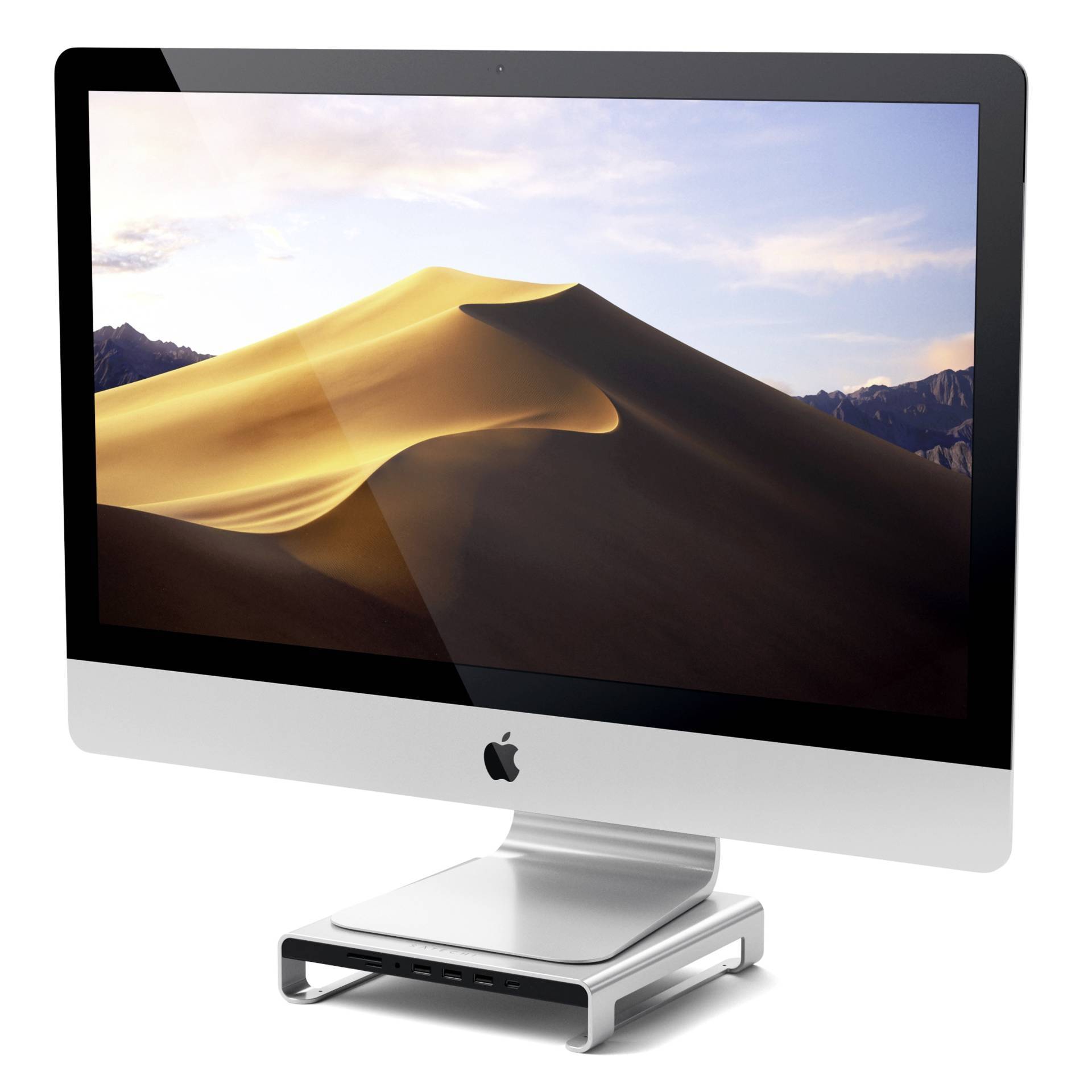 Ein Computerbildschirm zeigt ein Wüstenlandschaft-Wallpaper mit einem großen Sanddünen unter blauem Himmel. Darunter ist ein Desktop-Computer auf einem Ständer zu sehen.