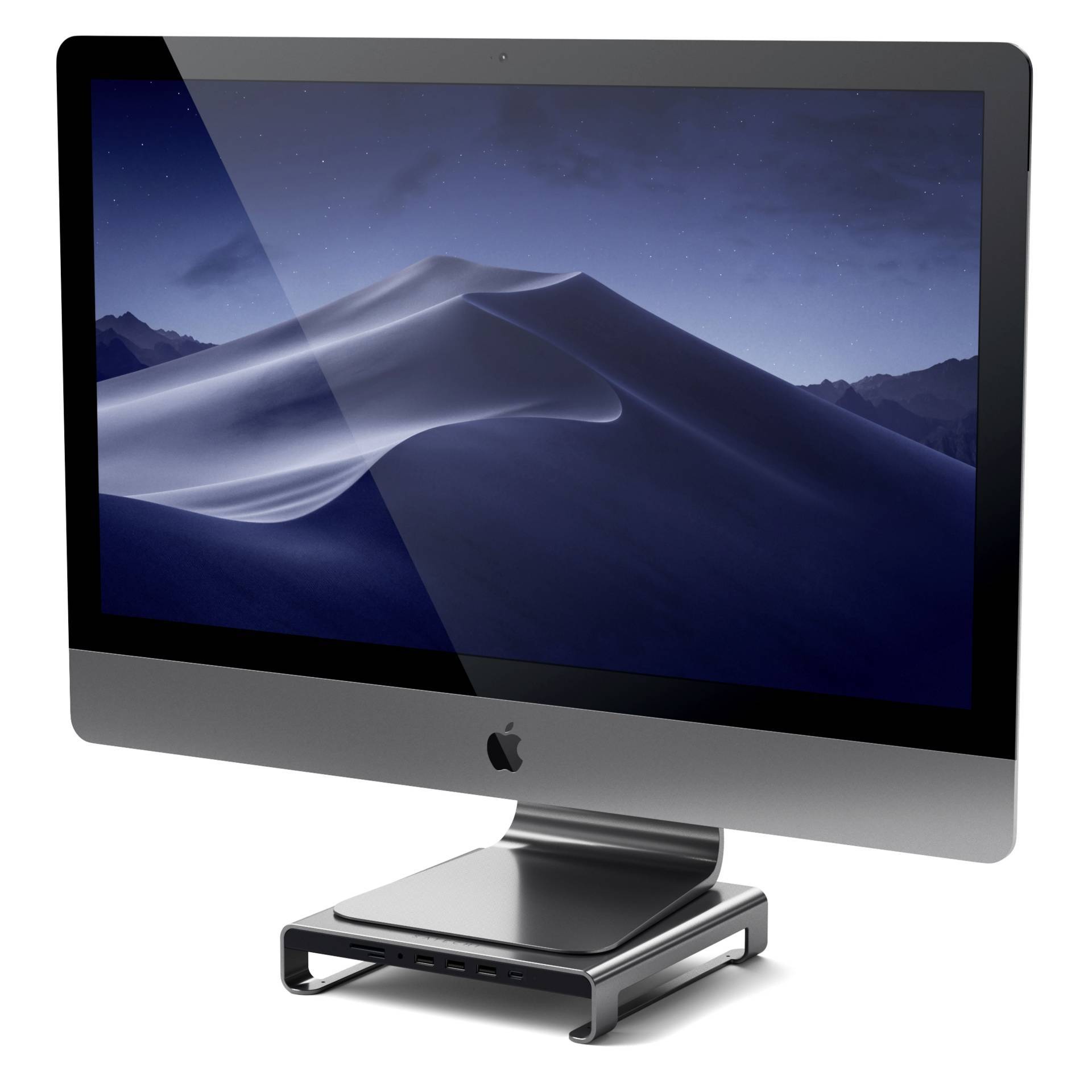 Ein silberner All-in-One-Computer mit einem laufenden Bildschirmschoner, der eine Wüstenlandschaft bei Nacht zeigt, auf einem schwarzen Standfuß.