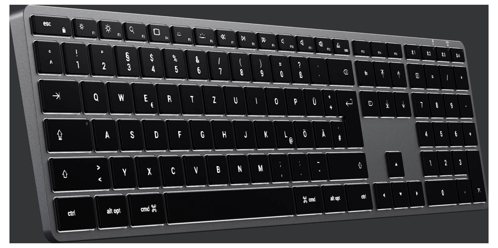 Kabellose deutsche QWERTZ-Tastatur mit Ziffernblock auf dunklem Hintergrund. Ideal für Computerarbeiten und schnelle Texteingabe.