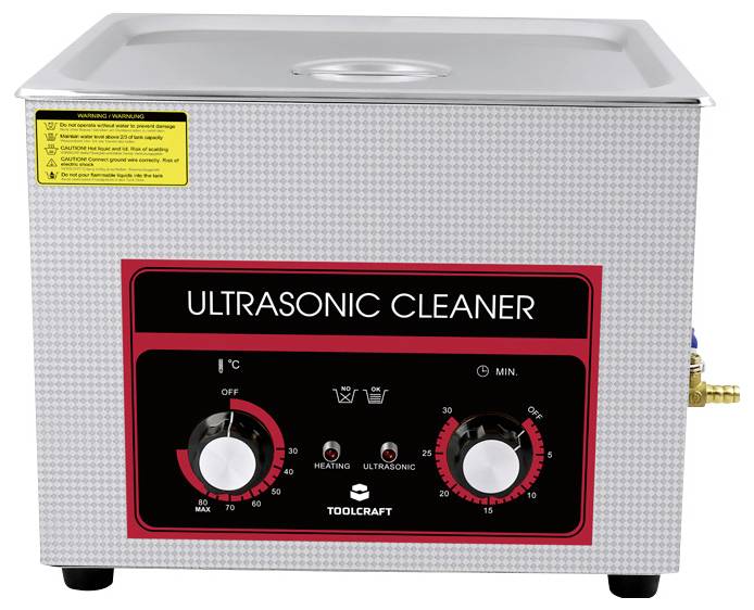 'Ungenutzter Ultraschallreiniger mit roten Bedienelementen und Temperaturanzeige. Geeignet zum Reinigen empfindlicher Gegenstände.'