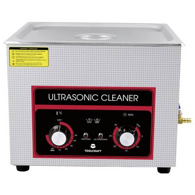 'Ungenutzter Ultraschallreiniger mit roten Bedienelementen und Temperaturanzeige. Geeignet zum Reinigen empfindlicher Gegenstände.'