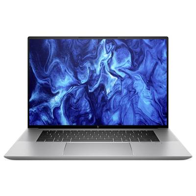 Ein Laptop mit modernem, randlosem Design und einem blauen, abstrakten Hintergrund auf dem Bildschirm.