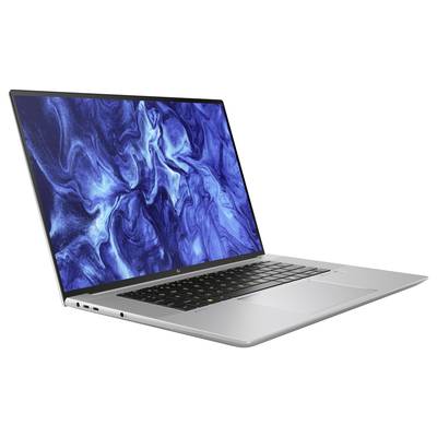 Ein silberner Laptop mit geöffnetem Bildschirm zeigt ein blau-weißes, marmoriertes Muster. Er hat eine schwarze Tastatur.