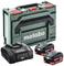 Grüner Werkzeugkoffer von Metabo mit zwei Akkus und einem Ladegerät, geeignet für elektrische Werkzeuge.