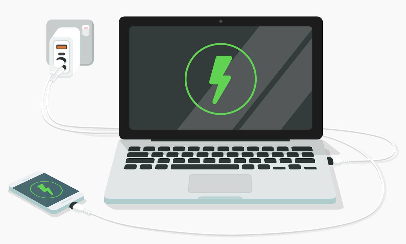 Ein Laptop und ein Smartphone werden aufgeladen. Beide Geräte sind per Kabel mit einer Steckdose verbunden.