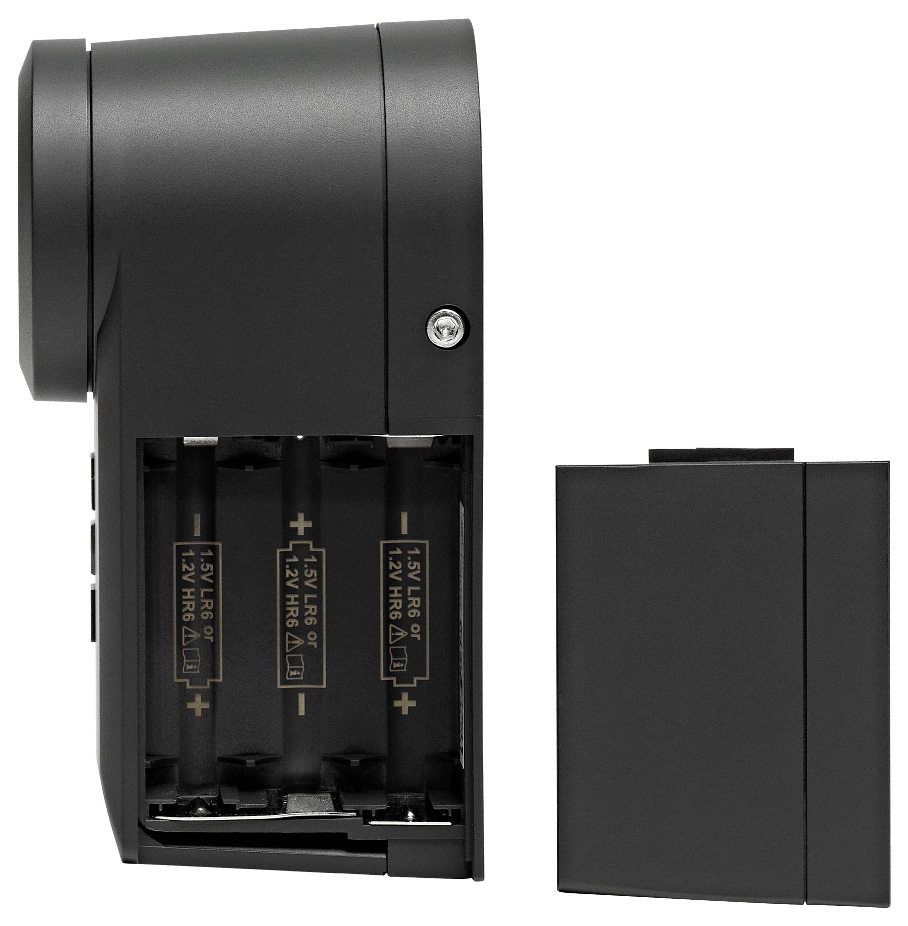 Ein schwarzes Batteriefach mit drei AA-Batterienplätzen, abgedeckt von einem abgenommenen Batteriefachdeckel.