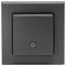 Ein moderner, dunkelgrauer Lichtschalter an einer Wand, quadratisches Design mit einem kleinen Quadratsymbol in der Mitte.