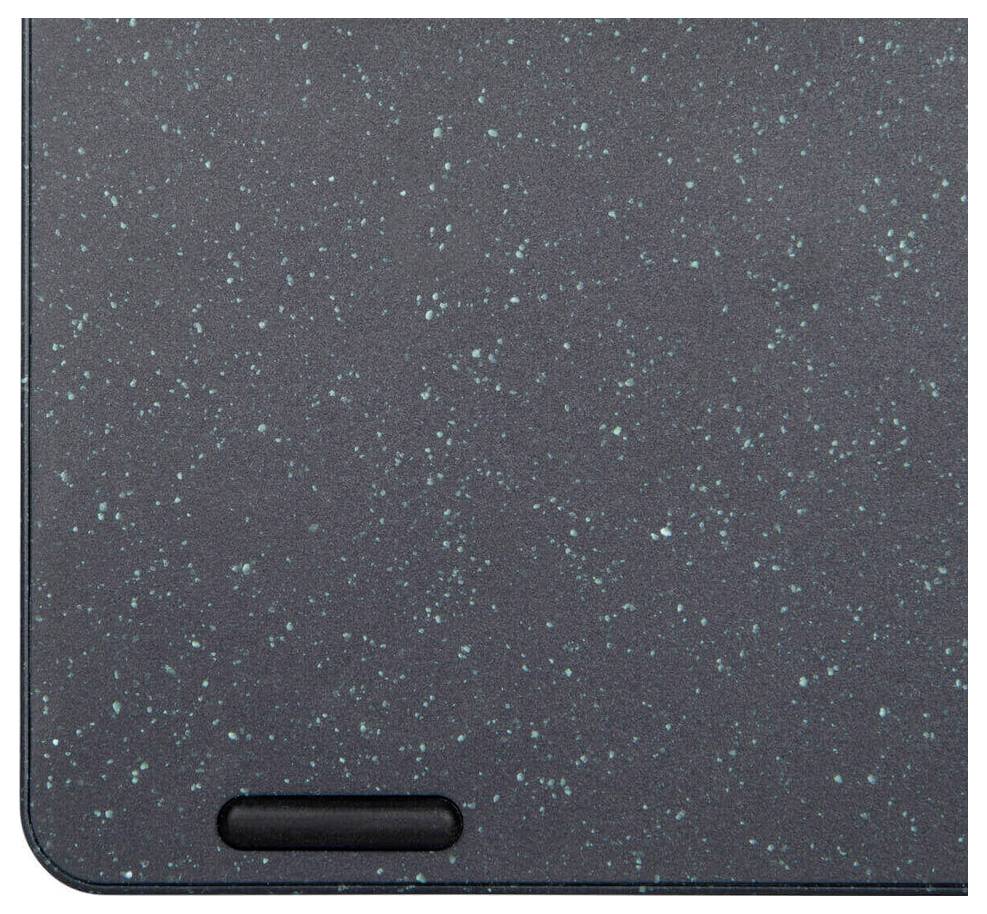 Dunkelgraue Oberfläche mit feinen, gleichmäßig verteilten türkisfarbenen Flecken; unterer Rand mit schmalem schwarzen Bereich.