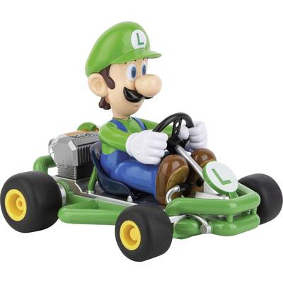 Eine Figur in einem grünen Anzug fährt ein grünes Go-Kart.