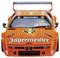 Ein orangefarbener BMW M1 Rennwagen mit 'Jägermeister'-Werbung und Flügelspoiler, frontal fotografiert.