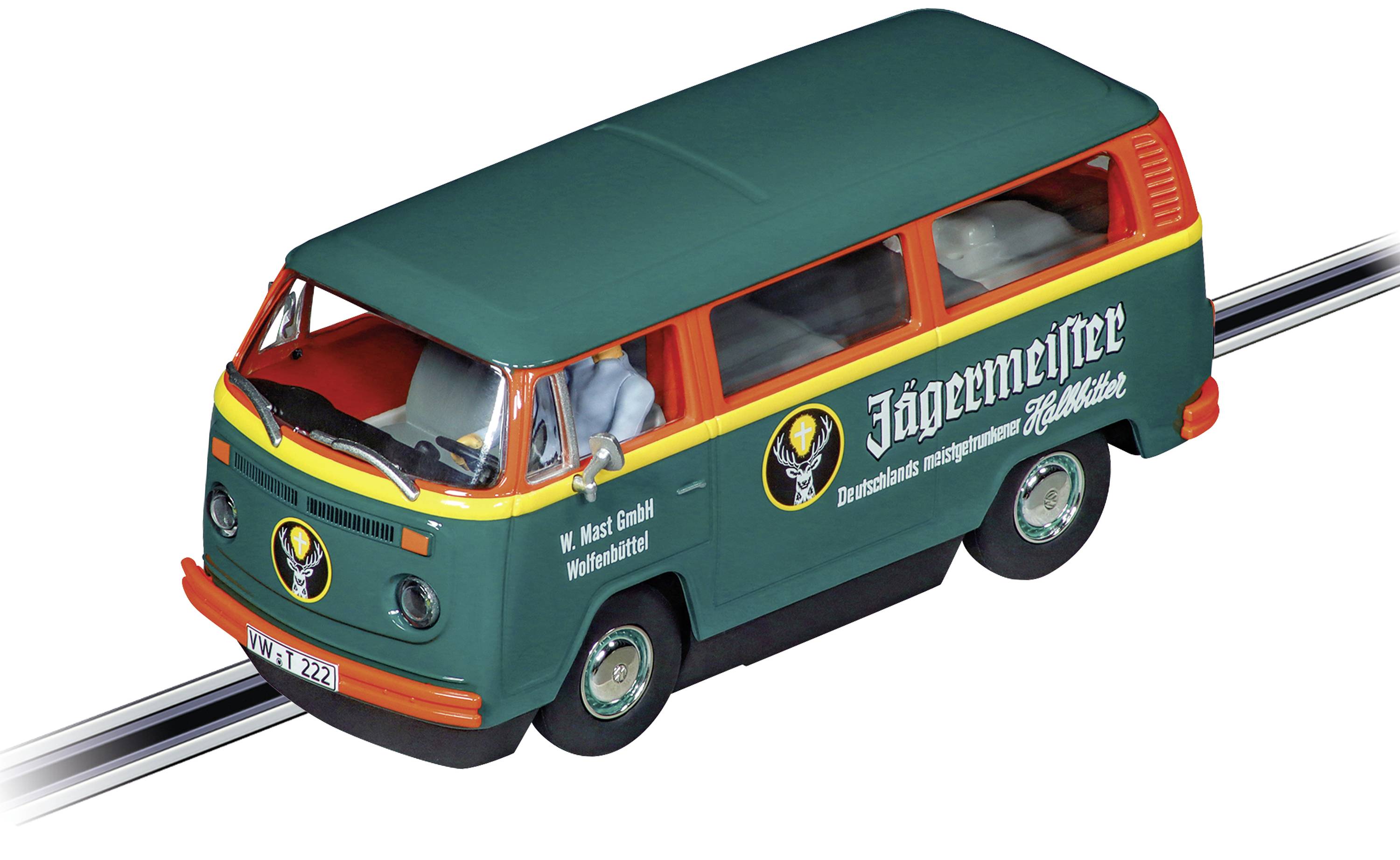 Ein grüner Spielzeug-Bus im Jägermeister-Design mit Aufschrift 'Deutsches moosgrünes Modellauto', steht auf einer Spielzeug-Rennbahn.