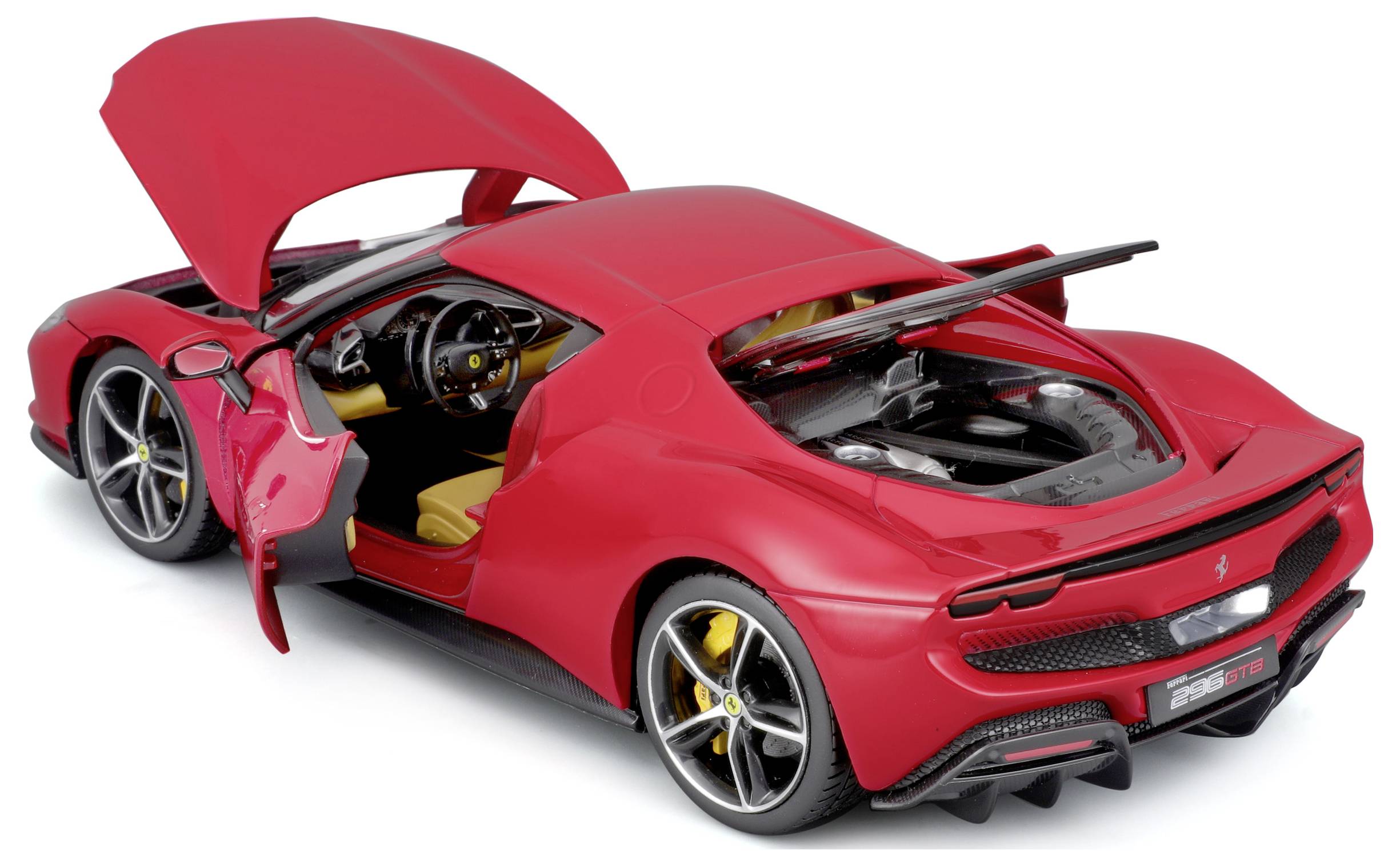 Rotes Sportwagenmodell mit geöffneter Motorhaube und Tür. Sicht auf Innenraumdetails und Motor.