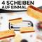 Ein Toaster mit 4 Toastscheiben. Text oben: '4 Scheiben auf einmal'. Hintergrund unscharf mit farbigen Details.