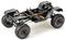 Ferngesteuertes Auto-Chassis mit Dämpfern, grobstolligen Reifen und sichtbarer Verkabelung, bereit für individuelle Anpassungen.