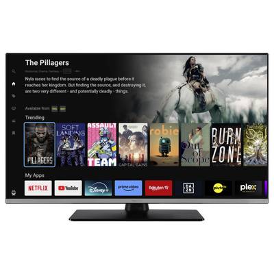 Fernseher zeigt ein Streaming-Menü mit Filmposter und Apps wie Netflix, Amazon Prime, und mehr. Hauptfilm 'The Pillagers' wird hervorgehoben.