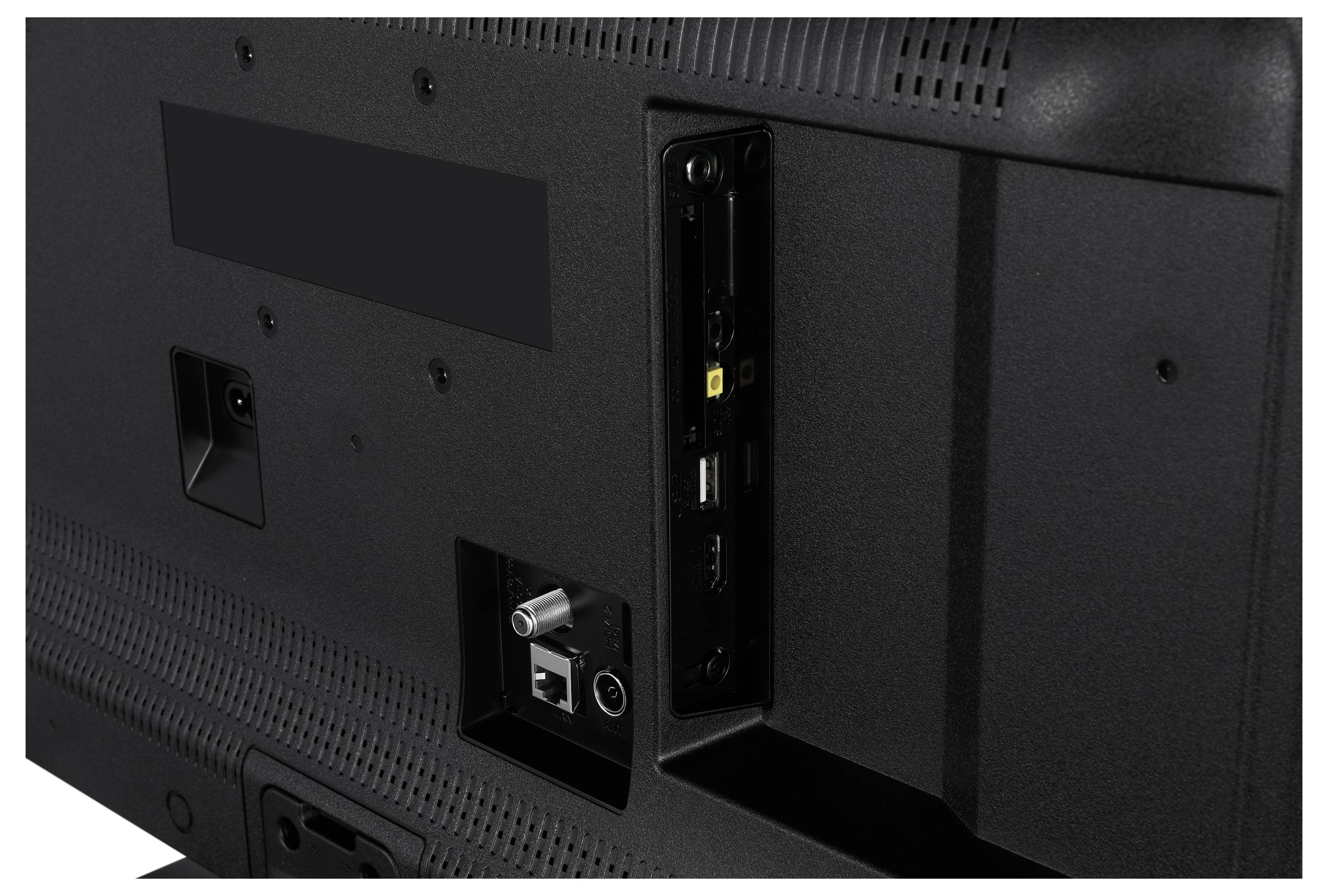 Rückansicht eines Fernsehers mit sichtbaren Anschlüssen, darunter HDMI, USB und Antenneneingang.