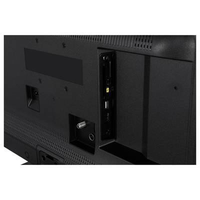 Rückansicht eines Fernsehers mit sichtbaren Anschlüssen, darunter HDMI-, USB- und Koaxial-Anschluss.